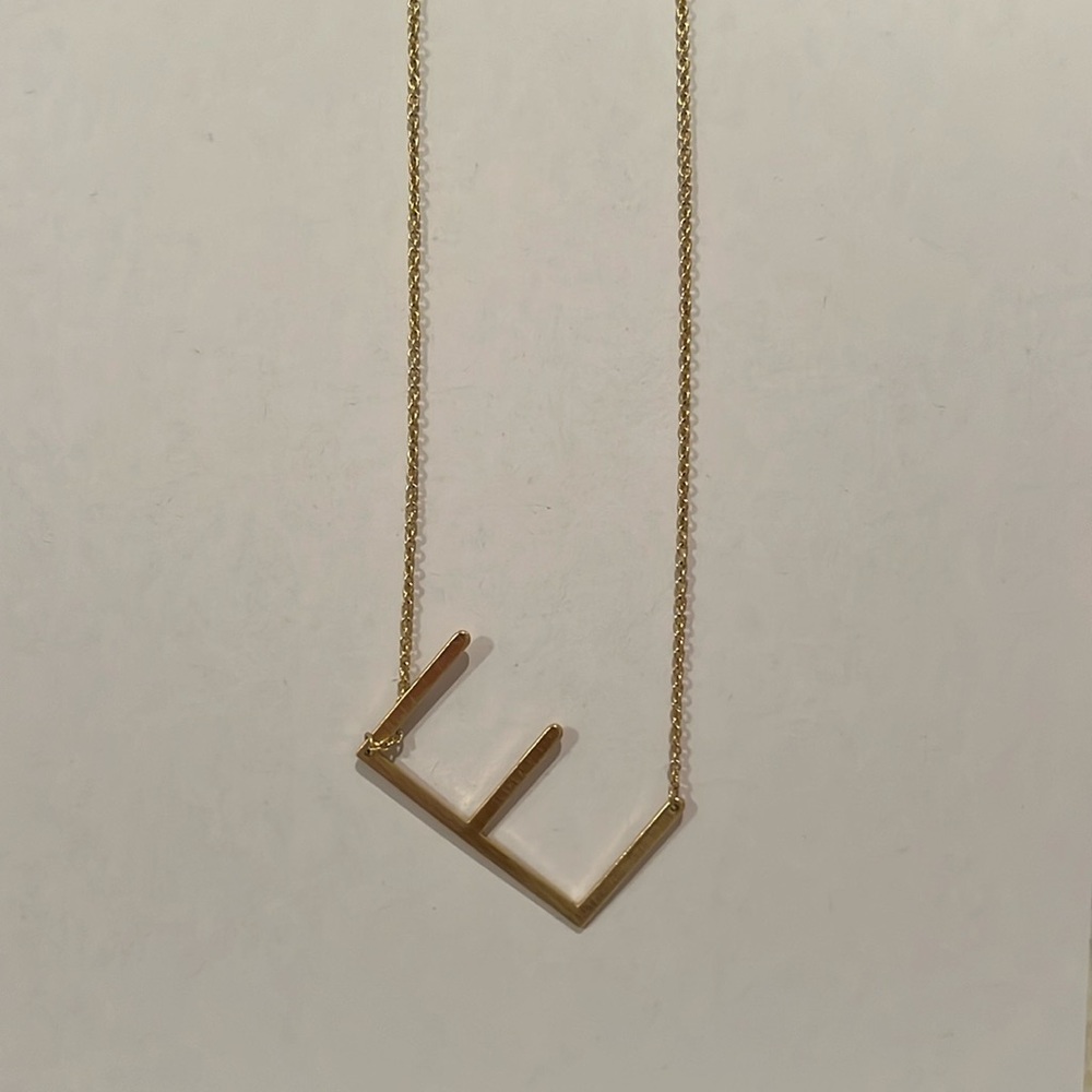 Gold letter E necklace